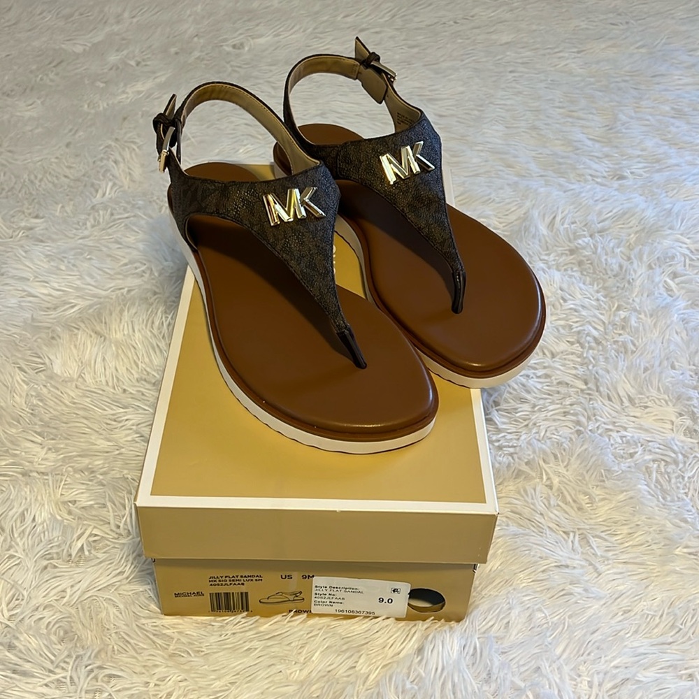 Michael Kors sandals, size 9, brown with MK on it. NWT.